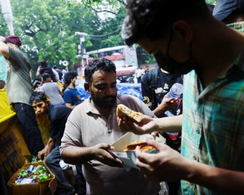 Food, fury and supporters near and far keep India protest alive