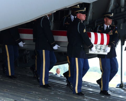 Trump greets the fallen as he faces a decision point on Iran