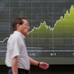 Asian shares are mostly higher and Mideast tensions push Brent crude past $96