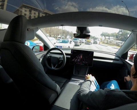 Tesla's once-bullish tone on robotaxis shifts