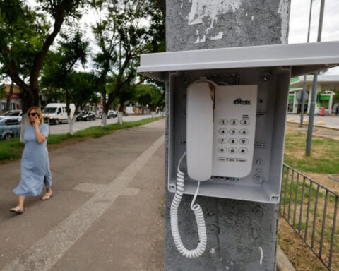 Crimea brings back public street phones for emergency calls