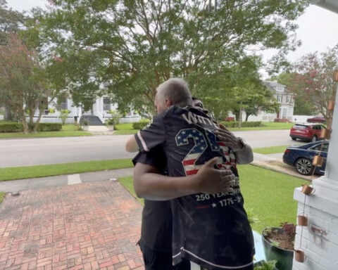 Neighbors kick open door to save sleeping couple from fire