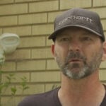 'Hero' neighbor uses garden hose to keep fire from spreading