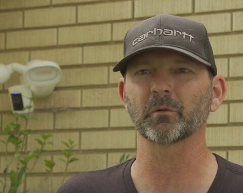 'Hero' neighbor uses garden hose to keep fire from spreading