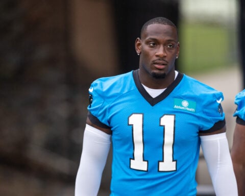 Panthers lose OLB Nic Scourton to torn ACL on first day of training camp, AP source says
