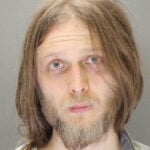 Man stabs sister 20 times, wounds brother after argument over barking dogs, police say