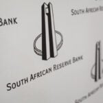 South Africa central bank surprises with rate hold, says policy tight enough
