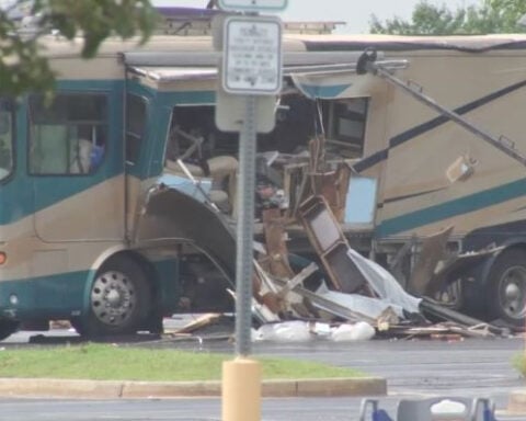 Man in custody after hours-long RV standoff outside Walmart