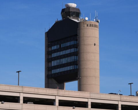 Two planes nearly collided in Boston after a false alarm and a controller forgot who he cleared for takeoff, the NTSB reports