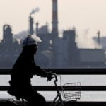 Japan's factory activity stays firm as output surges in July, PMI shows