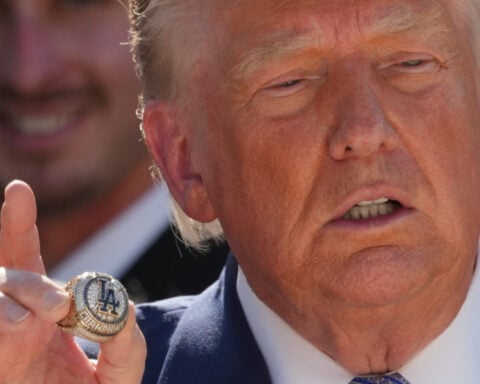 The Latest: Trump imposes double-digit tariffs on dozens of countries