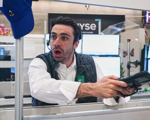 Stocks waver on Wall Street while crude oil prices fall for the first time in a week