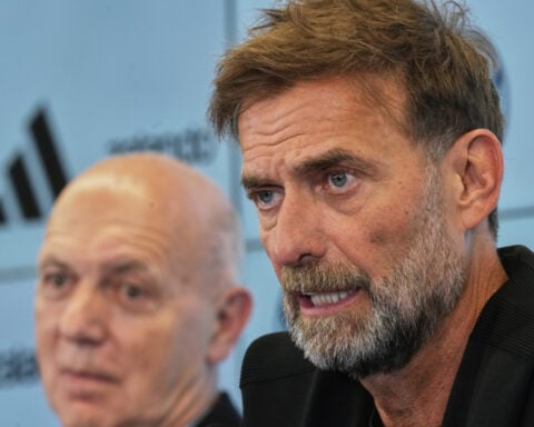 Jürgen Klopp starts Germany coach job with talk of resigning