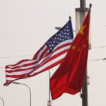China's top police chief and FBI director vow closer law enforcement cooperation