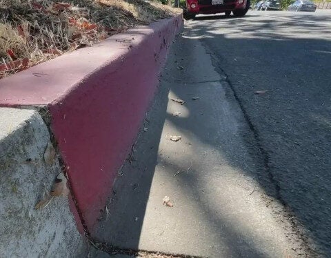 Someone is painting illegal red curbs in Sacramento, and the city wants it to stop