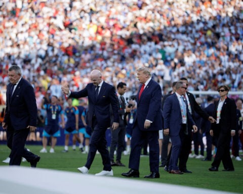 Soccer-IOC rejects human rights group complaint against Infantino over Trump support
