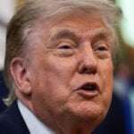 Trump says US and Iran are talking, but Tehran is not yet ready for deal