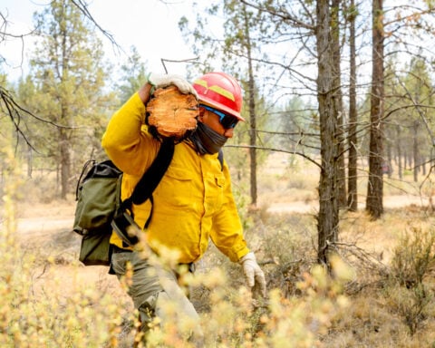 Oregon firefighters brace for windy and hot weather as they battle dozens of blazes