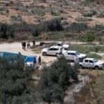 Israeli troops round up Palestinians in West Bank village after shootout involving settlers