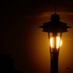 Seattle police are searching for two men who parachuted from the Space Needle