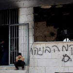 Israeli settlers set fire to West Bank mosques after deadly clash