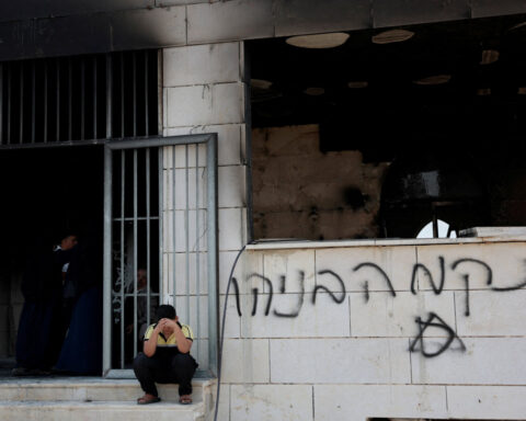 Israeli settlers set fire to West Bank mosques after deadly clash