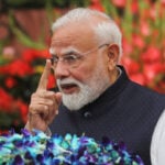 India PM Modi announces panel to overhaul exam system after protests