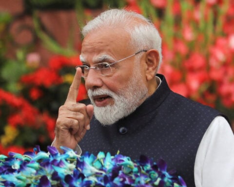 India PM Modi announces panel to overhaul exam system after protests