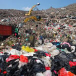 As Indonesia cuts methane emissions, life atop a mountain of garbage begins to change