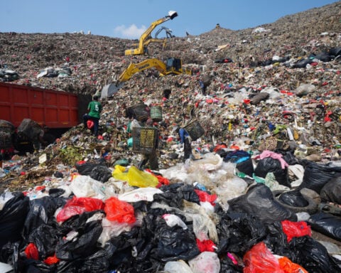 As Indonesia cuts methane emissions, life atop a mountain of garbage begins to change