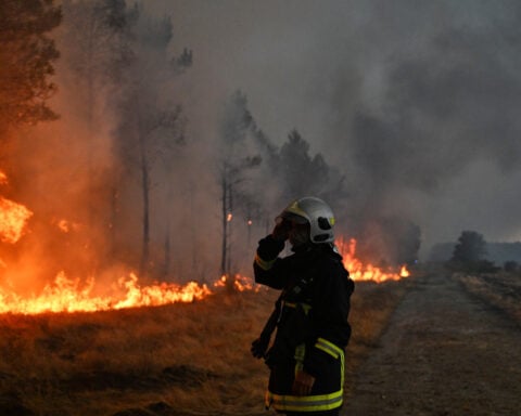 Macron calls crisis meeting as monster wildfires drive 250,000 from their homes