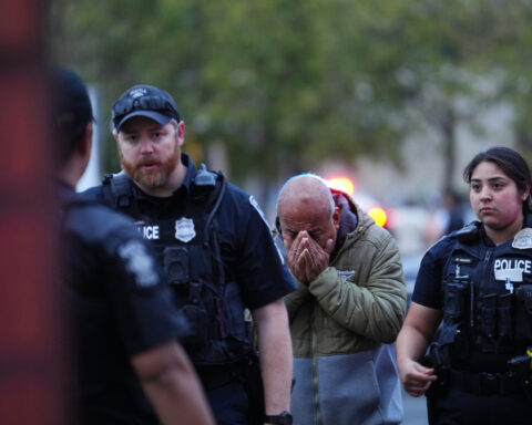 Police arrest 1 person and search for another after Seattle festival shooting that killed 3