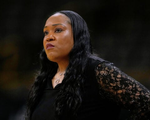 Virginia and coach Amaka Agugua-Hamilton reach a settlement after her sudden dismissal