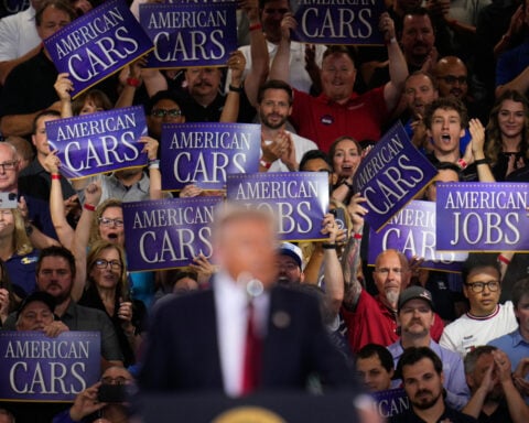 Trump defends his tariffs during Michigan visit even as businesses say they've hurt the state