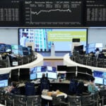 European shares subdued as earnings boost counters tech slide
