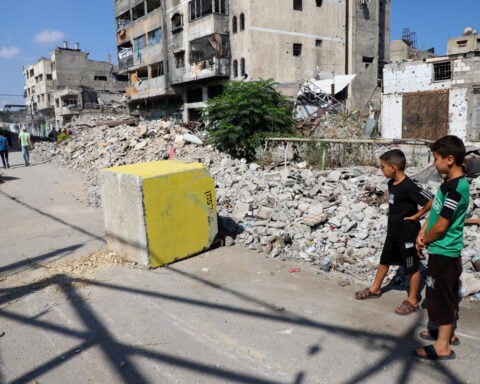 Israel's yellow line, a shifting edge of war pushing Gazans from home