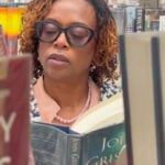 Judge reaching people outside the courtroom as an author