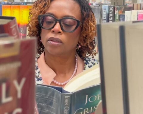 Judge reaching people outside the courtroom as an author