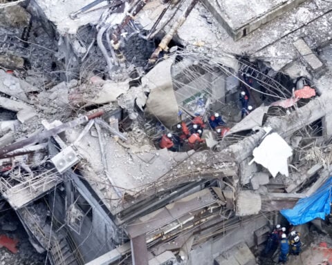 Death toll rises to 18 as rescuers comb through quake rubble in southwestern Japan