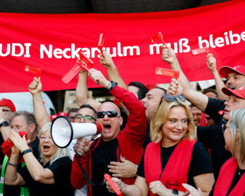Thousands of Audi workers protest over threatened plant closure
