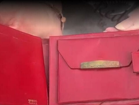 'The wallet that came home': Lowell High renovation uncovers wallet lost in 1972
