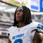 Lions running back Jahmyr Gibbs reports to training camp but doesn't attend team's first practice