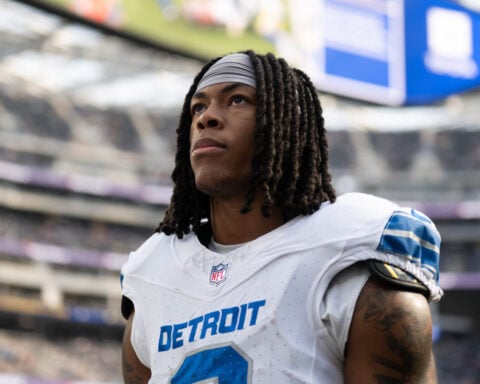 Lions running back Jahmyr Gibbs reports to training camp but doesn't attend team's first practice