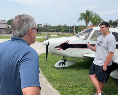 Teen flies himself to world's largest aviation gathering
