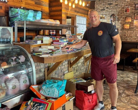 Pizza shop transforms patio into book haven, serving young readers