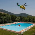 Firefighters in Spain battle the country's largest blaze ever recorded