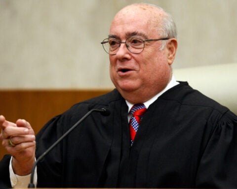Judge weighs bid to block or reverse transfers of transgender inmates into a segregated prison unit