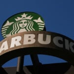 Starbucks reports strong quarterly sales and raises annual outlook