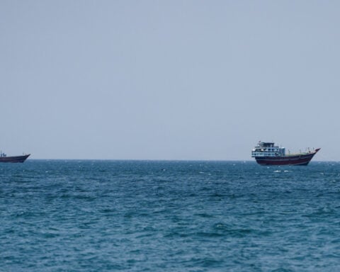 Oil prices slip as tankers continue to ply Middle East conflict zones