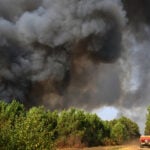 Cooler weather and potential rain move into the French region torched by wildfires